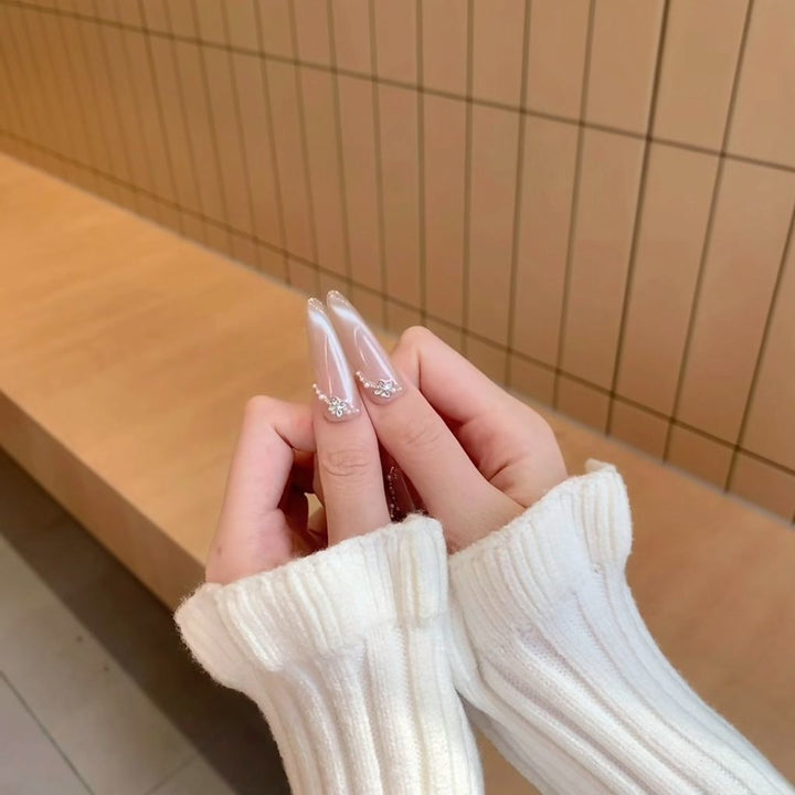 Exquisite Stiletto Nail Extensions with Crystal Accents