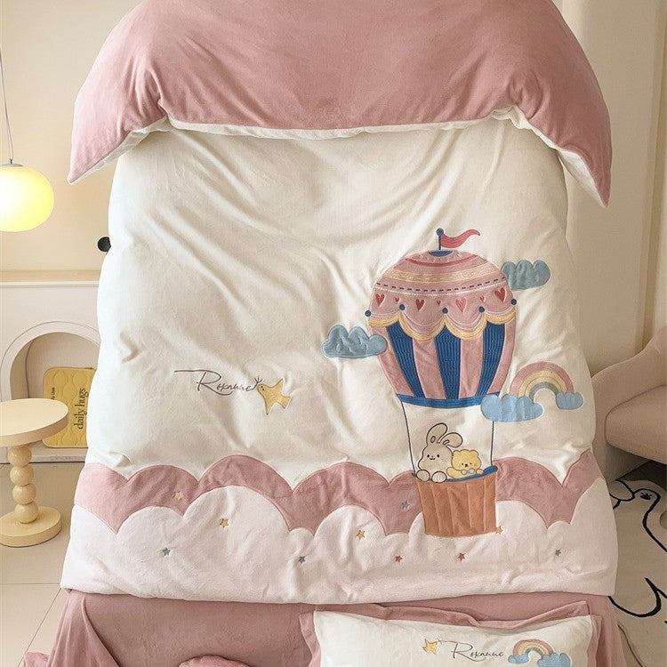Cozy reversible bedding set with moon and bunny appliqué