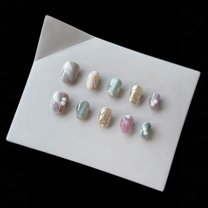 Artistic Press-On Nail Set with Pearl and Marble Accents