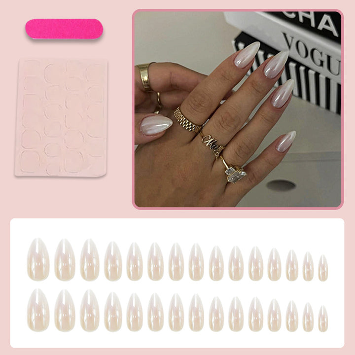 Acrylic nail set with elegant pointed shapes and glossy accents Kalsten