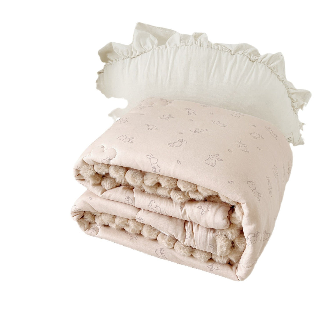 Cuddle blanket baby quilt with plush lining and bunny motif