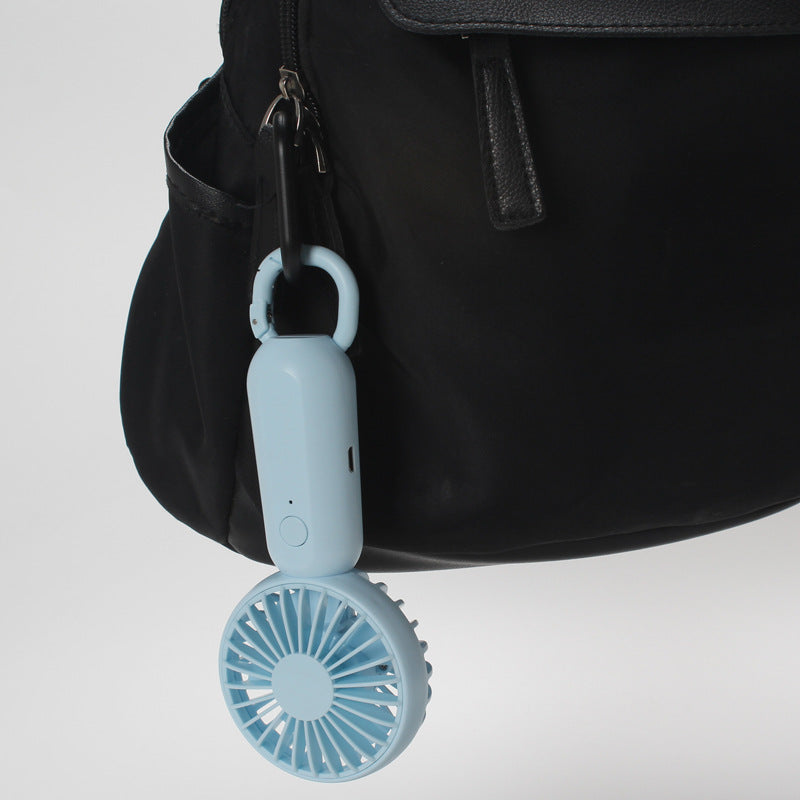 Women's compact portable handheld fan with rechargeable battery and carrying strap Kalsten