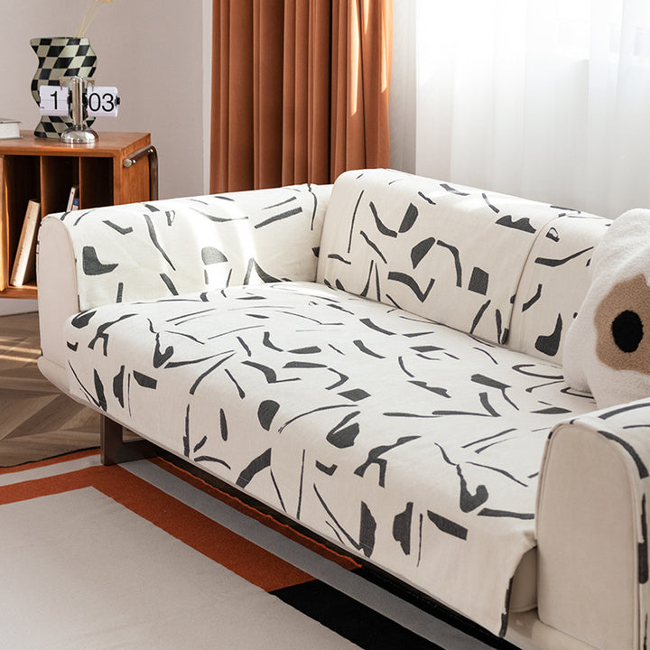 Stretch soft cover with abstract all-over print, elastic hem, and easy-care cotton blend