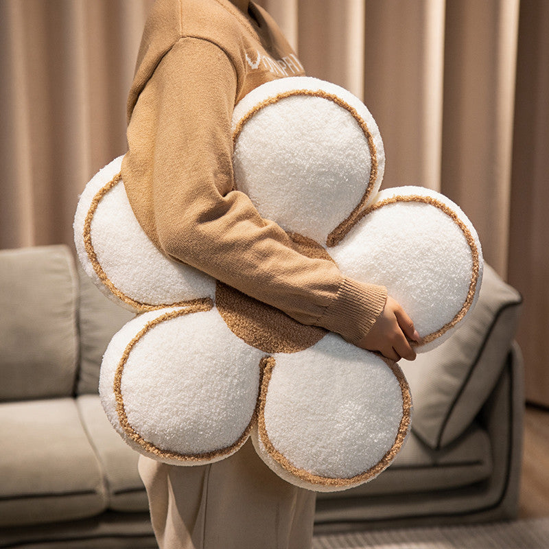 Padded seat cushion in flower shape with faux leather center piece and fluffy edge padding