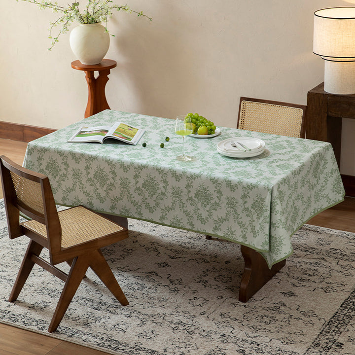Jacquard tablecloth with floral damask pattern and reinforced hem