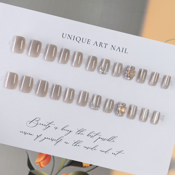 Decorative Nail Art with Rhinestone Accents