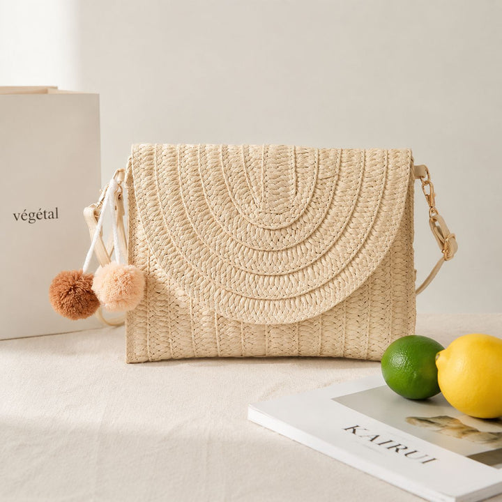 Braided shoulder bag with creative pom poms Kalsten