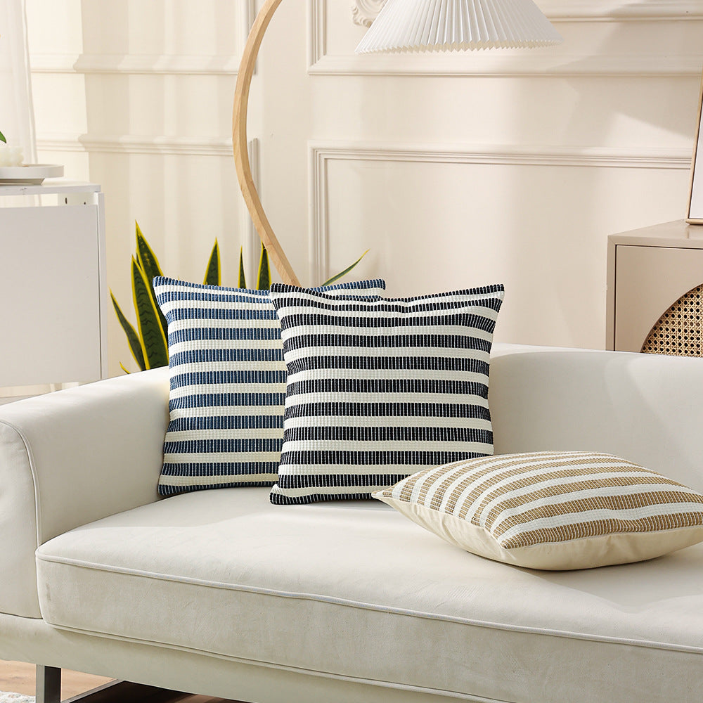 Woven square decorative cushion with fine ribbed texture and stripe pattern