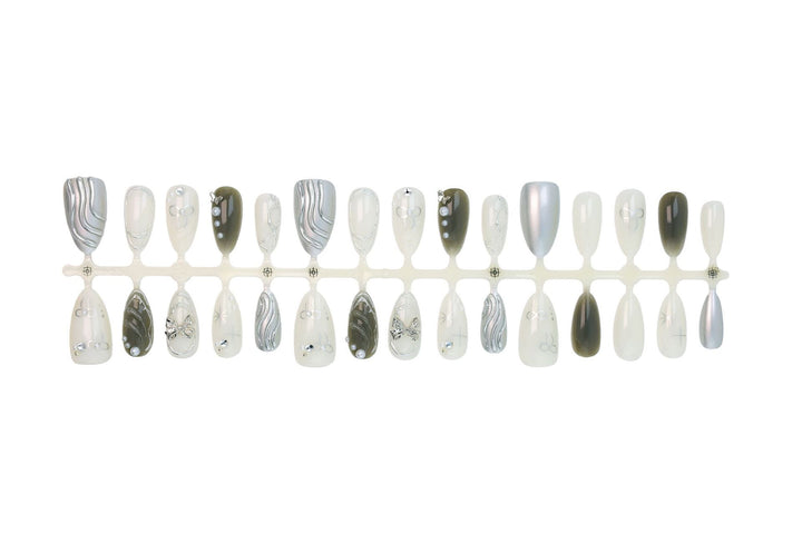 Nail set with luxurious 3D decorations and elegant stone accents Kalsten