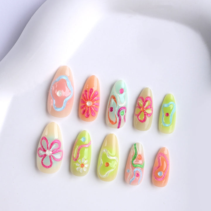 Artificial nails in the creative flower and foil design Kalsten