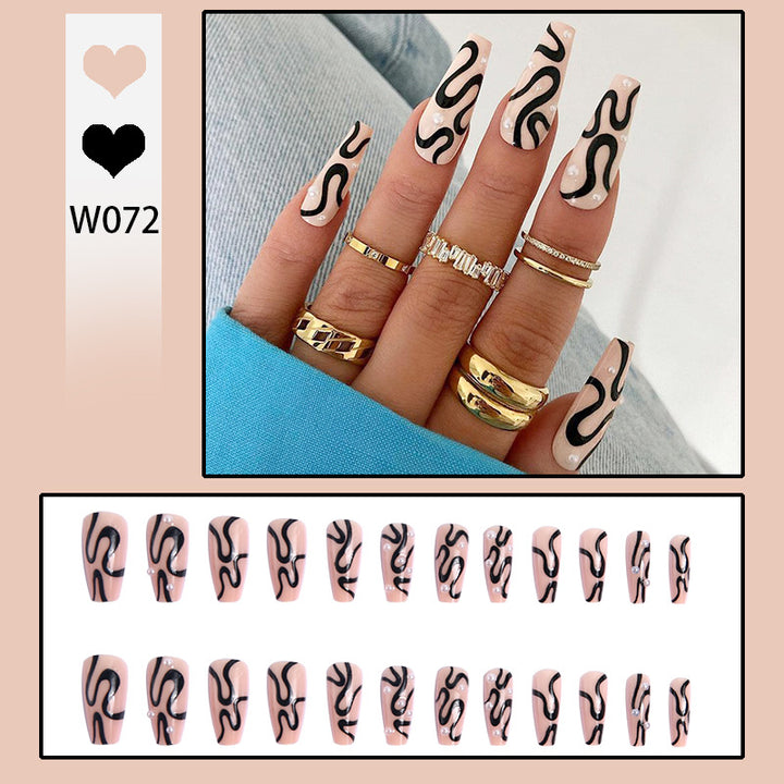 Artificial nail set with unique wave designs and glamorous accents Kalsten
