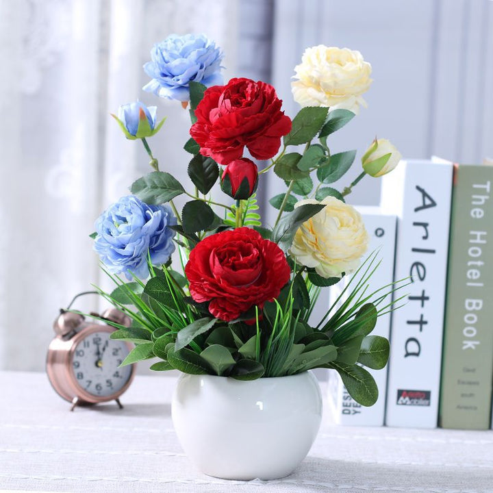 Artificial Floral Arrangement in Modern Ceramic Vase