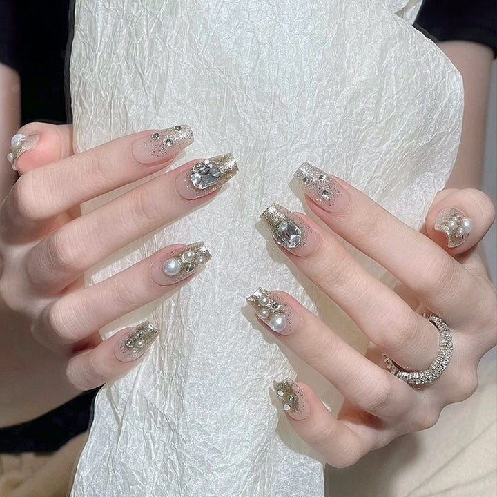Artificial nail set with elegant pearl and glitter design Kalsten