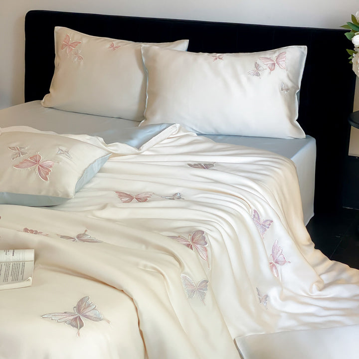 Elegant satin bedding set with embroidered butterfly details