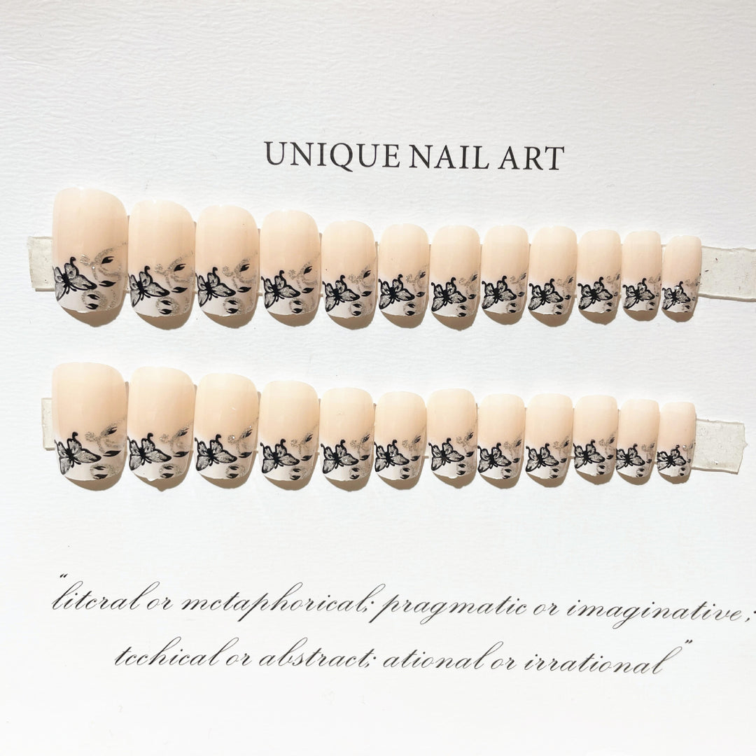Artistic Press-On Nail Set with Butterfly Designs