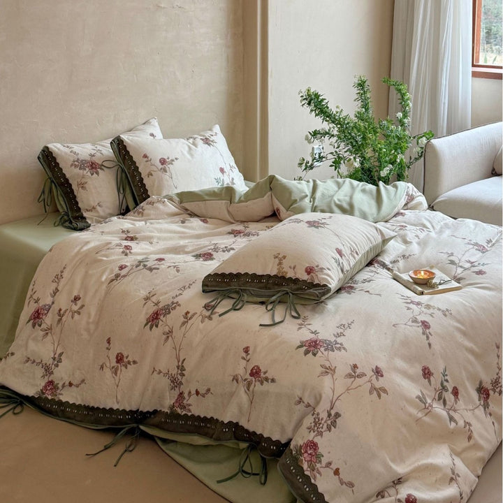 Percale bedding set with floral vintage embroidery, lace trim, and ties