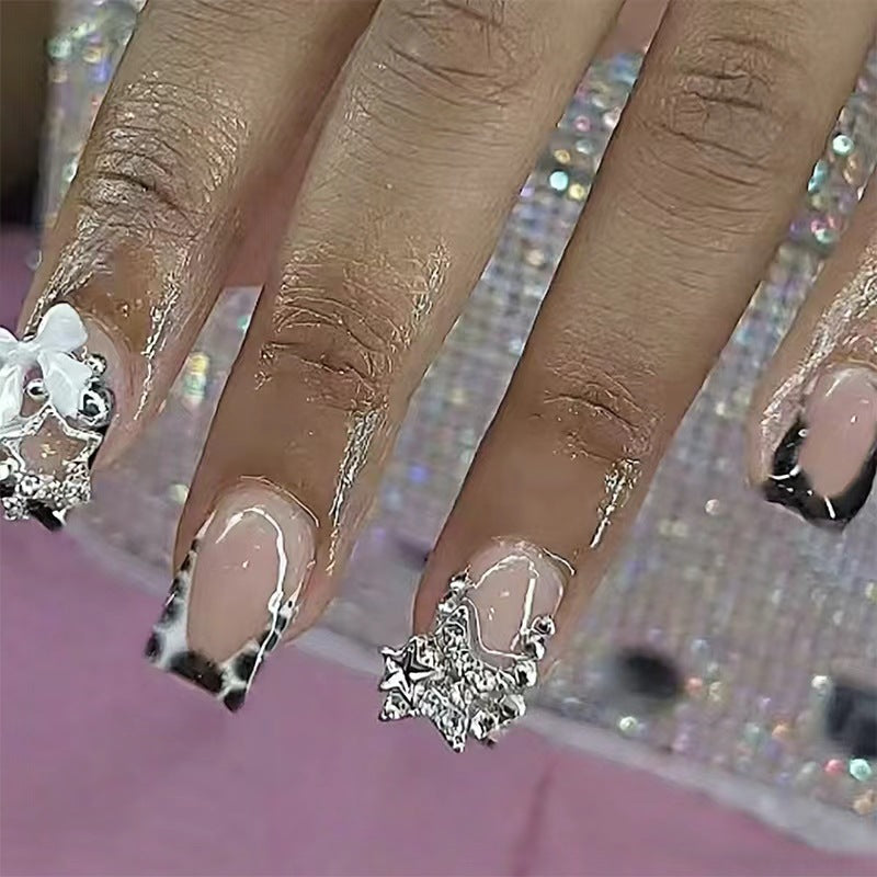 Acrylic nail set with glamorous golden accents Kalsten