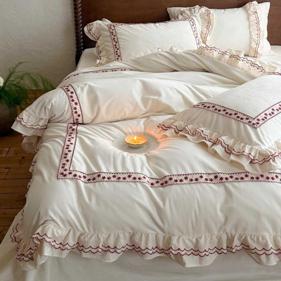 Romantic bedding set with ruffles and embroidered border