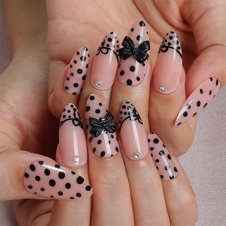 Creative nail art set with elegant dots and bow decorations Kalsten