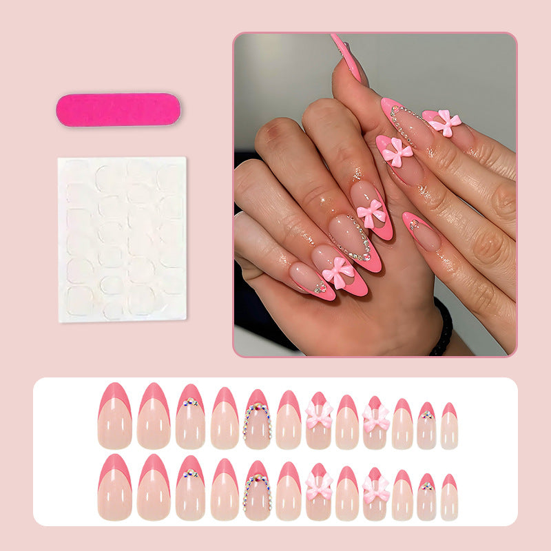 Artificial nail set with playful floral decorations and elegant glitter accents Kalsten