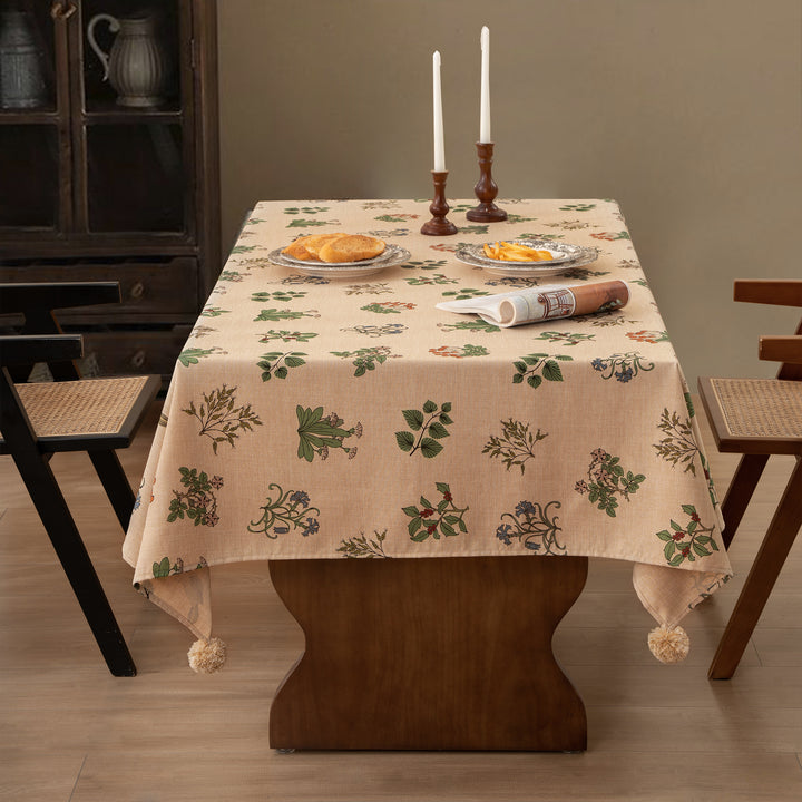 Woven tablecloth with ethnic Aztec pattern and pompom tassels