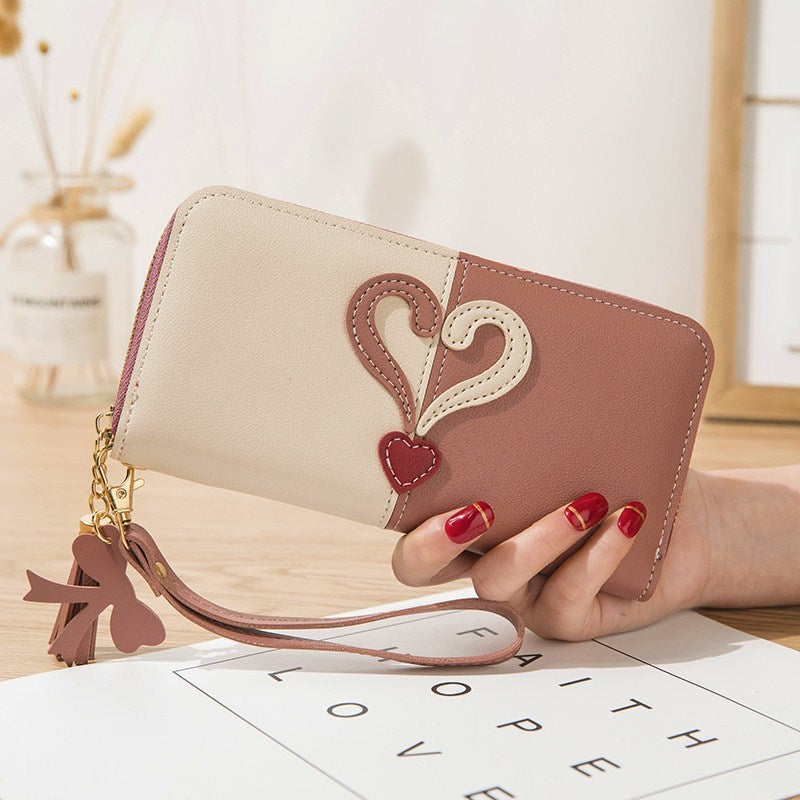Stylish wallet with heart appliqués Kalsten