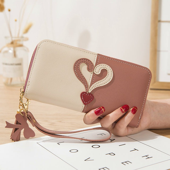 Stylish wallet with heart appliqués Kalsten