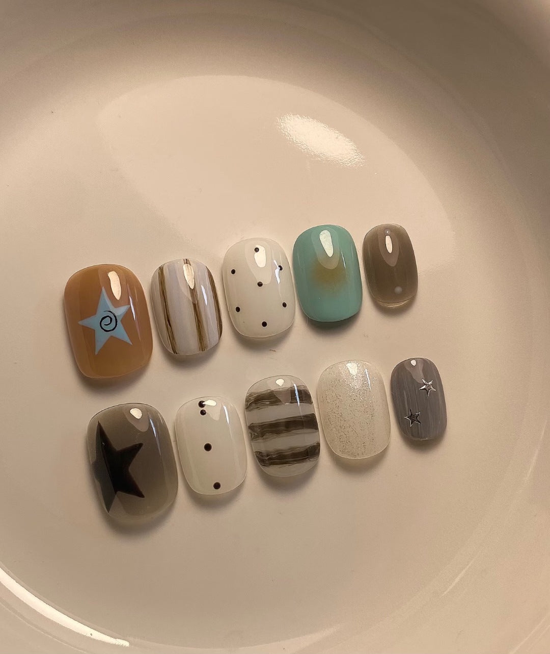 Artistic Press-On Nail Set with Geometric and Star Designs