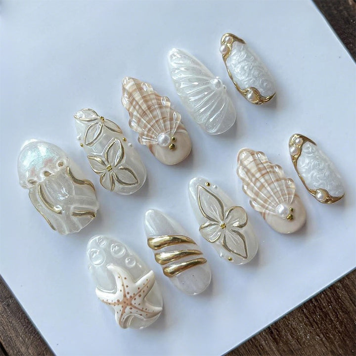Artificial nail set with filigree gold accents and elegant designs Kalsten