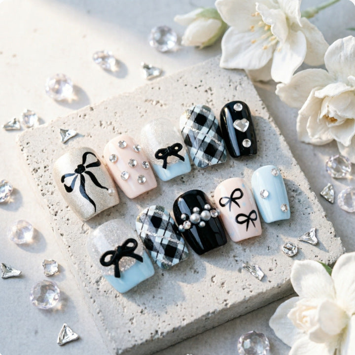 Artificial nails with elegant bows and rhinestones Kalsten