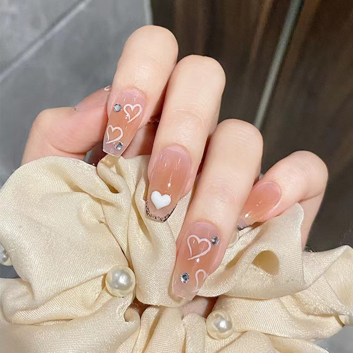 Artful nail tips in heart design Kalsten