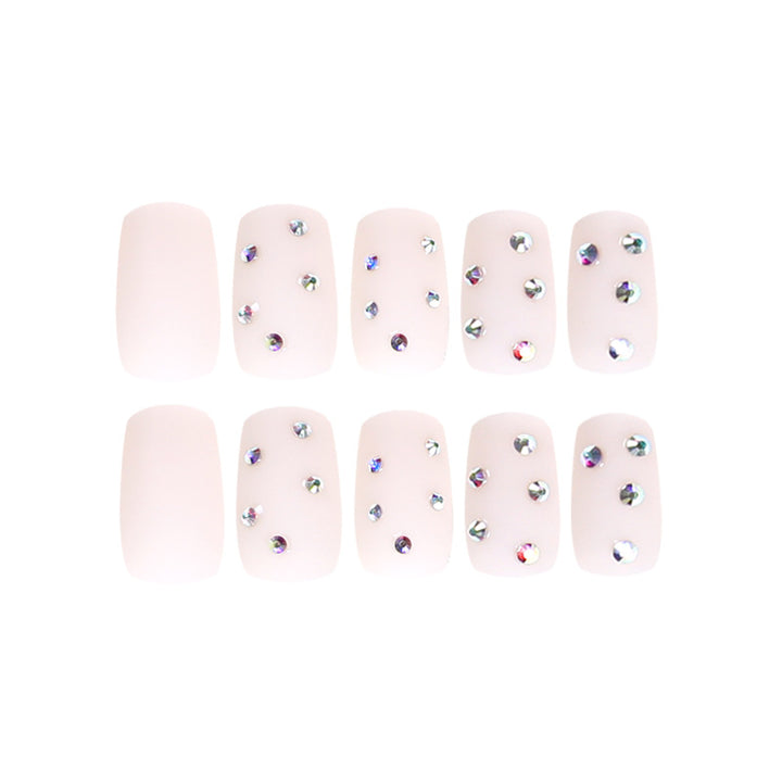 Artistic nail art with elegant rhinestone embellishments Kalsten