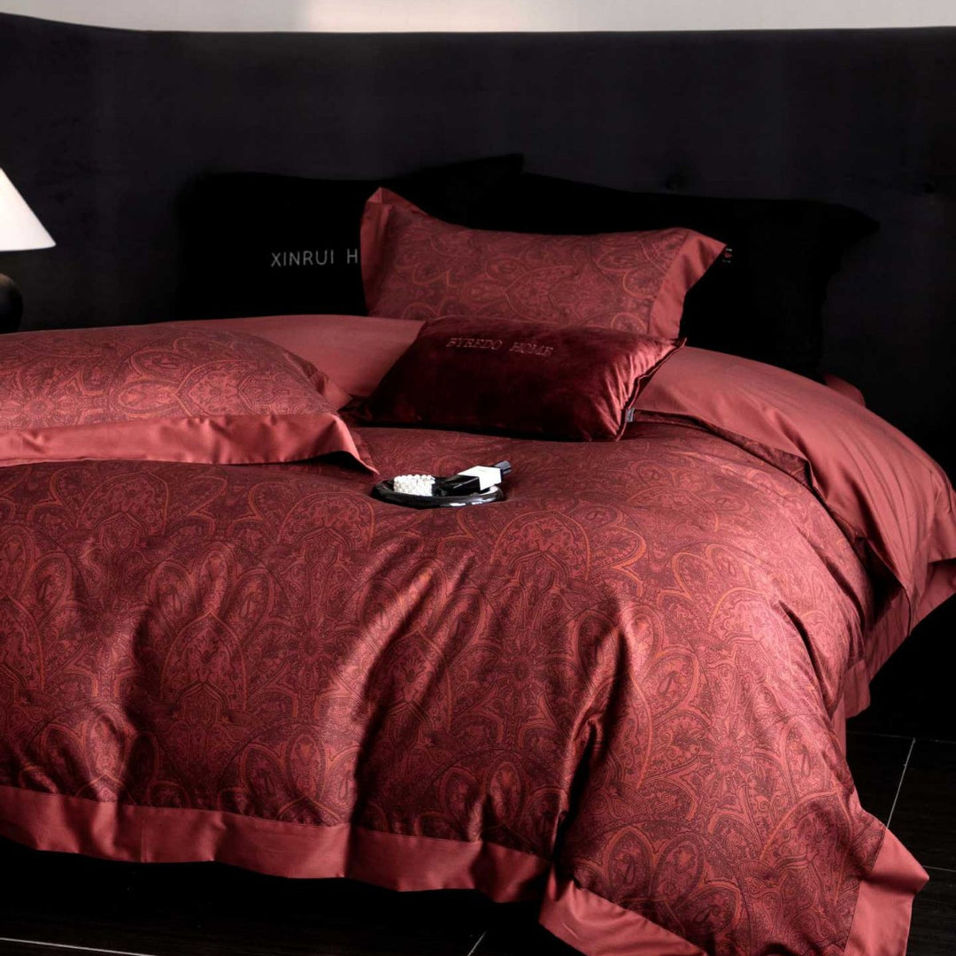 Reversible cotton satin bedding set with floral jacquard, contrast piping and decorative cushion