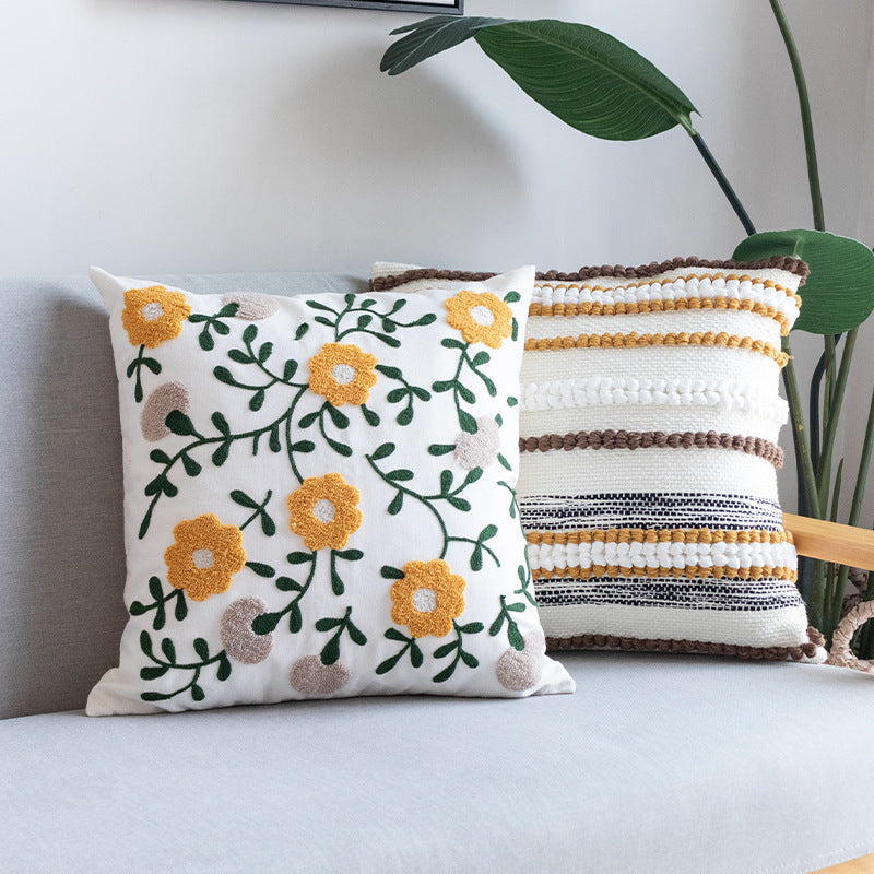 Embroidered square cushion cover made of cotton-linen with tufted flower appliqué