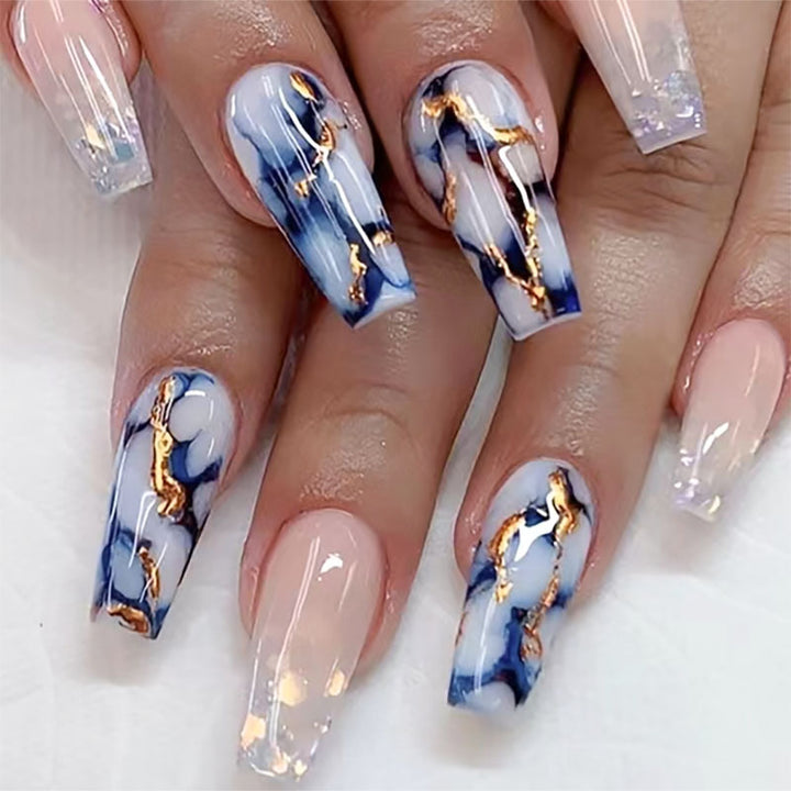 Long-Stiletto Abstract Nail Enhancements