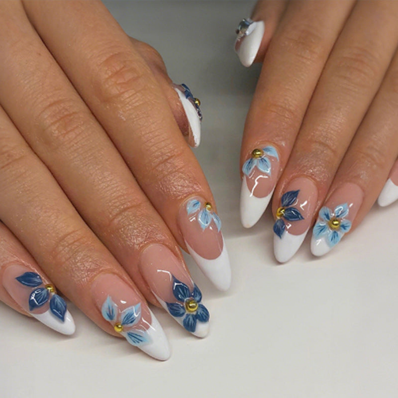 Nail art set with floral accents and elegant French tip Kalsten