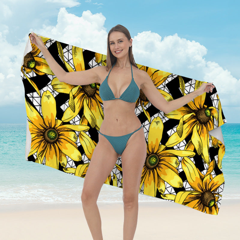 Beach towel with vibrant tropical plant motif Kalsten