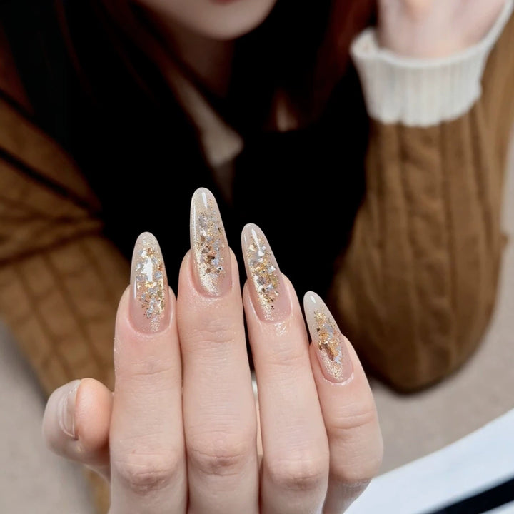 Elegant Stiletto Nail Extensions with Glitter Accents