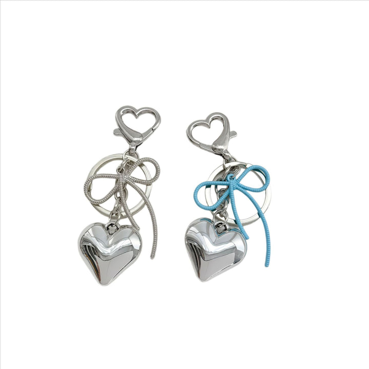 Heart-Shaped Metallic Keychain with Decorative Bow Kalsten