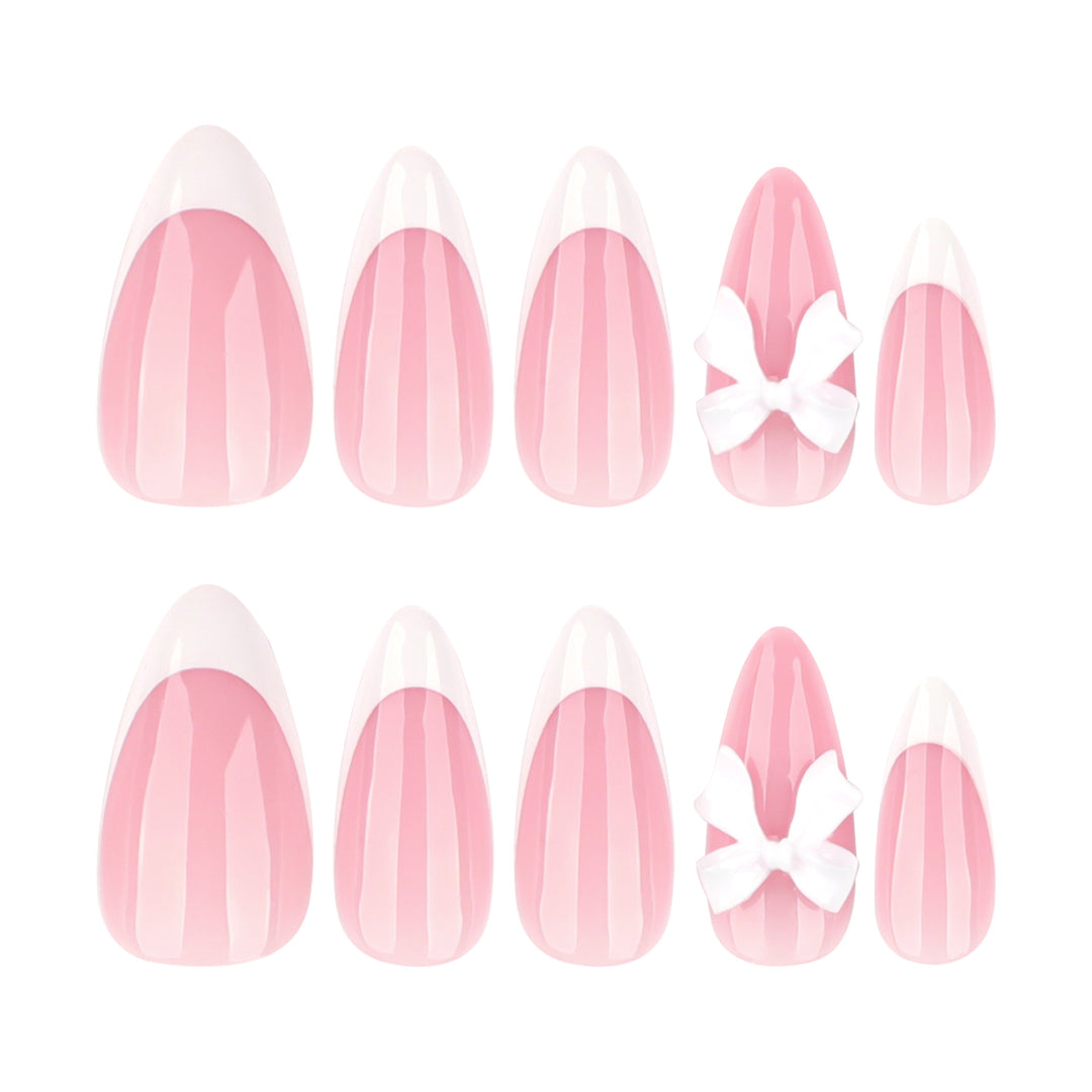 Artful nail designs with elegant tips and delicate bow motifs Kalsten