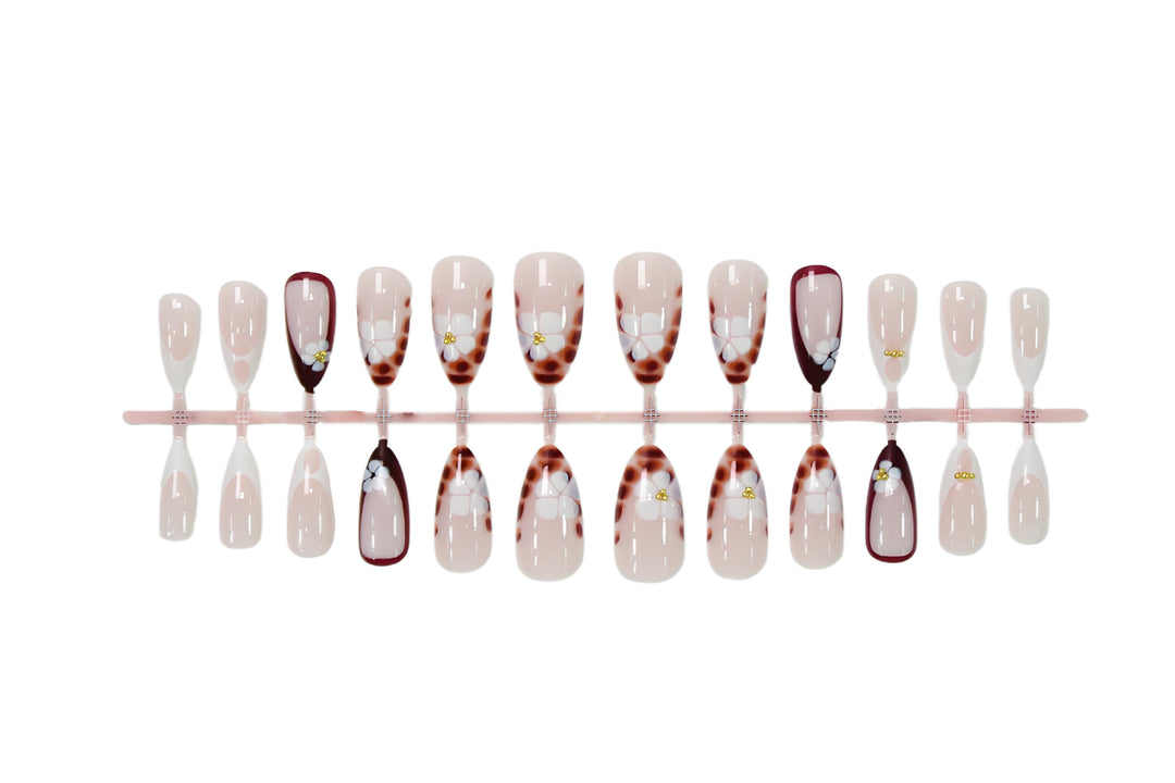Art nail set with elegant flower and ombré designs Kalsten