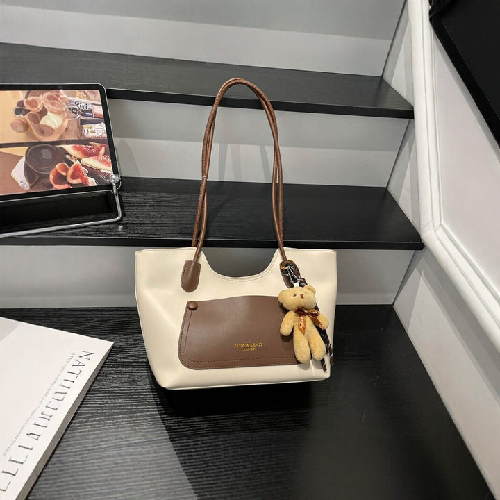 Elegant Tote Handbag with Plush Keychain