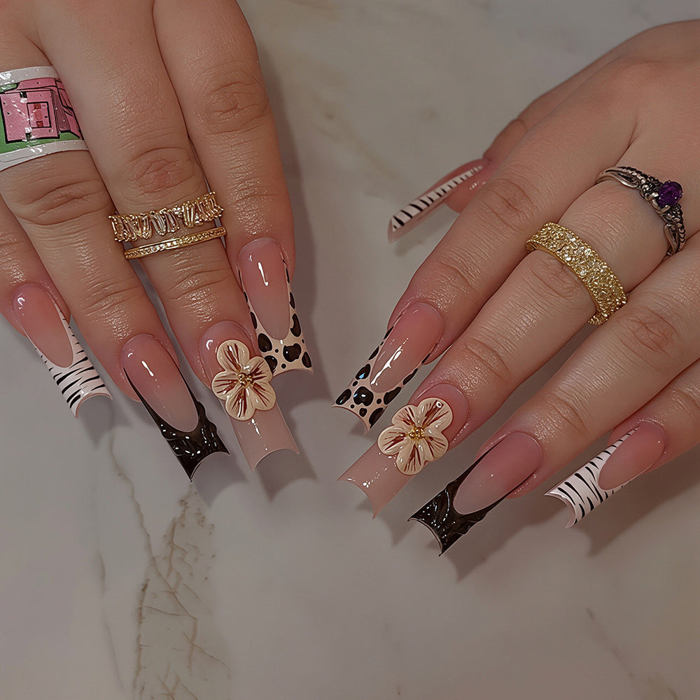 Artistic Press-On Nail Art Tips with Floral and Animal Print Designs Kalsten