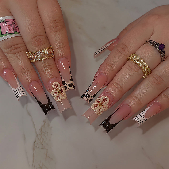Artistic Press-On Nail Art Tips with Floral and Animal Print Designs Kalsten