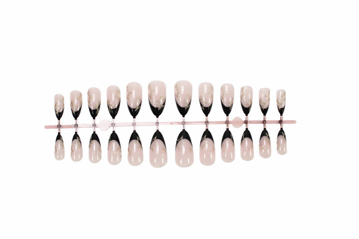 Acrylic nail set with elegant French tip design and glamorous accents Kalsten