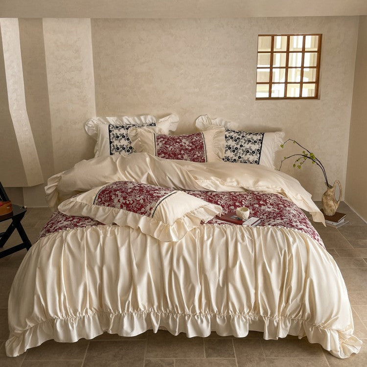 Romantic bedding set with gathered ruffle, jacquard centerpiece and decorative bedskirt