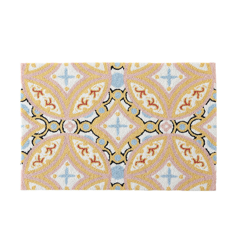 Rectangular hand-tufted bath mat rug with medallion-shaped ornament
