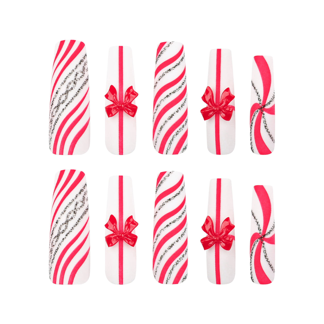 Artful Nail Art with Festive Bows and Christmas Motifs Kalsten