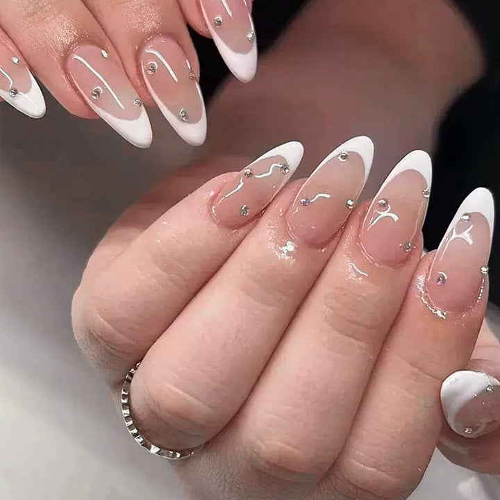 Nail kit with elegant French tips and sparkling accents Kalsten