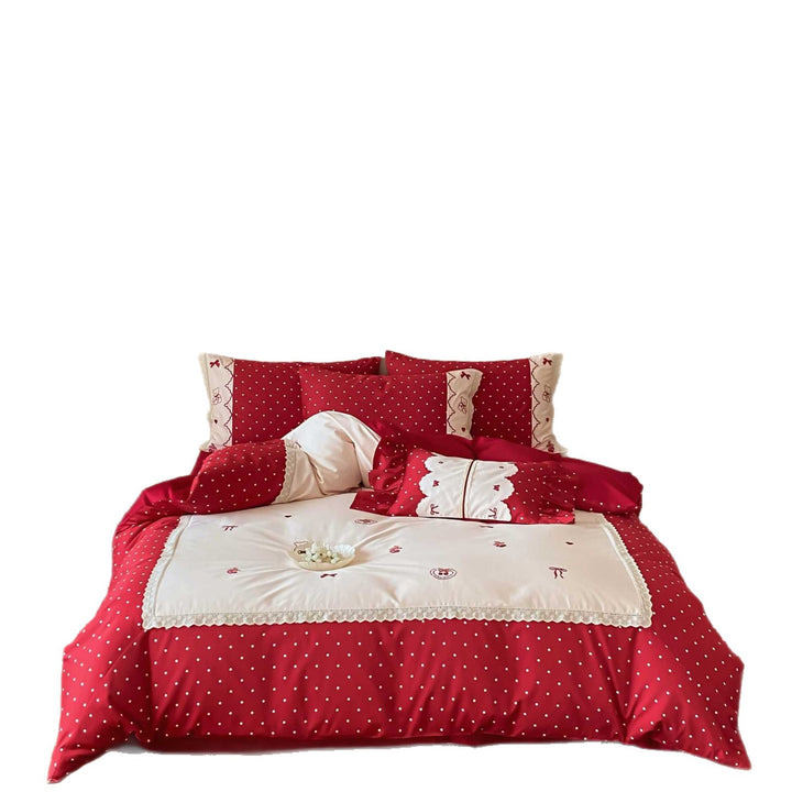 Country house style bedding set with polka dot design, decorative trim and pillowcase set